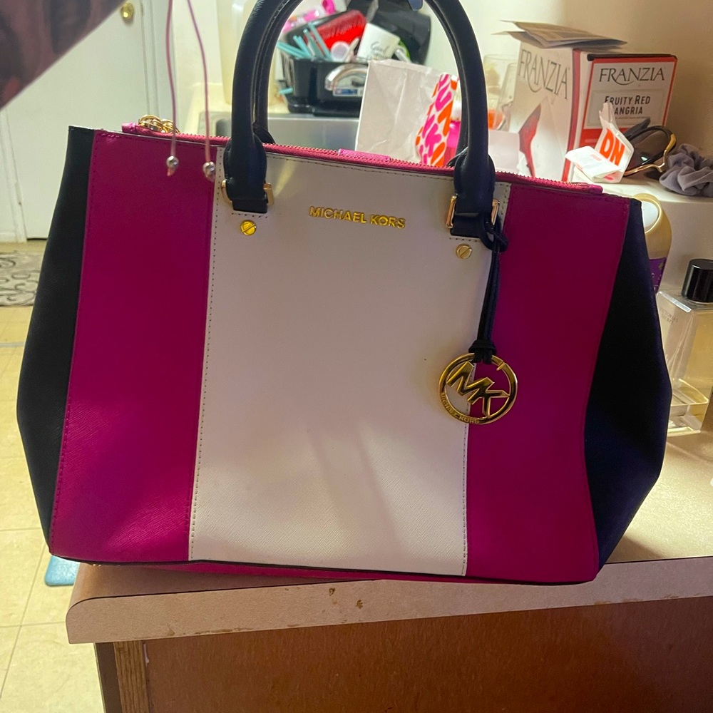 Pink white and black MK